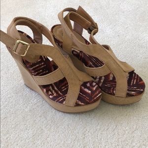 Tan wedges. Lightly worn.
